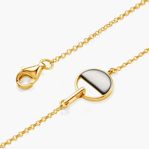 Bransoletka koło Savicki: srebrna pozłacana, onyks